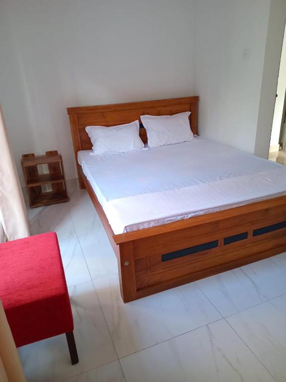Postel nebo postele na pokoji v ubytování Oasis Suite