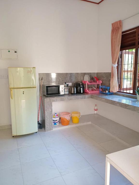 Kuchyň nebo kuchyňský kout v ubytování Oasis Suite