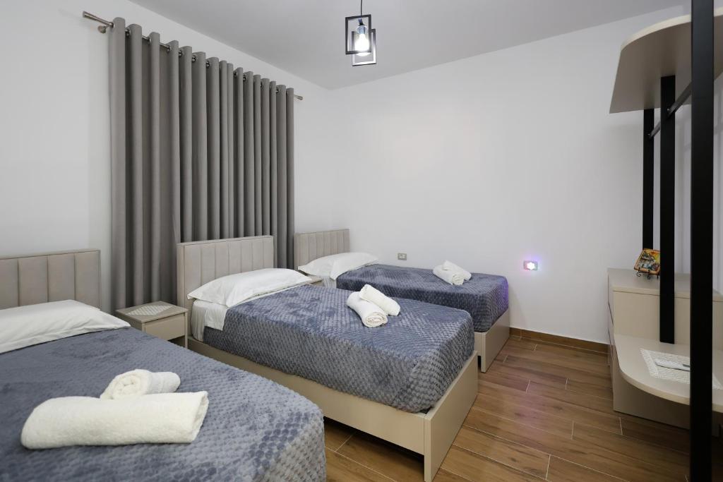 Postel nebo postele na pokoji v ubytování Villa Petro