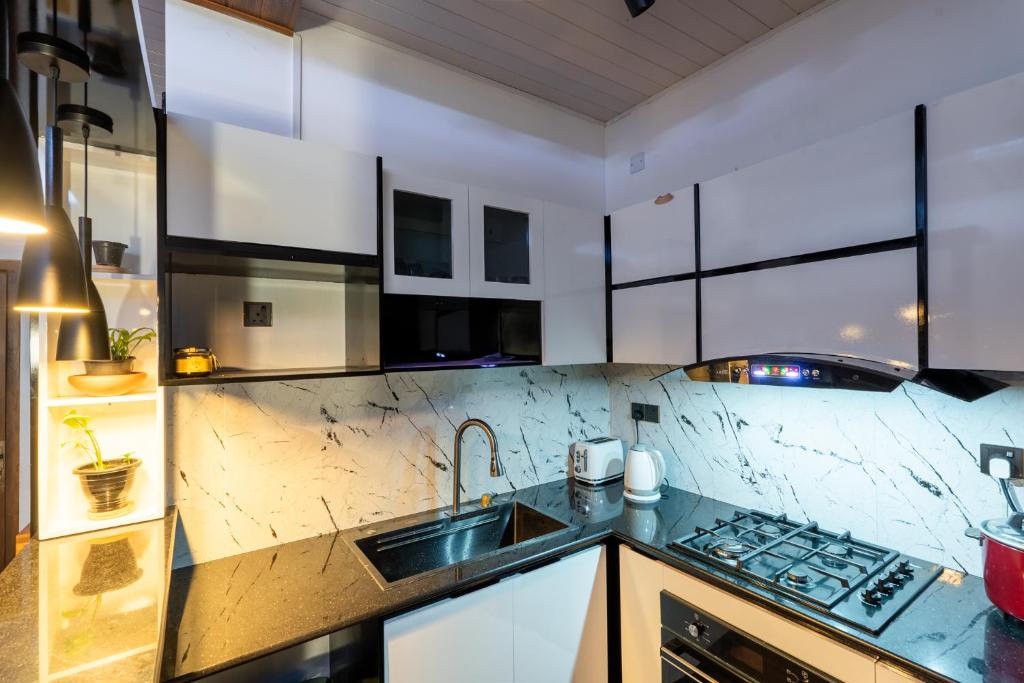 Kuchyň nebo kuchyňský kout v ubytování Golden stars hotel Dambulla