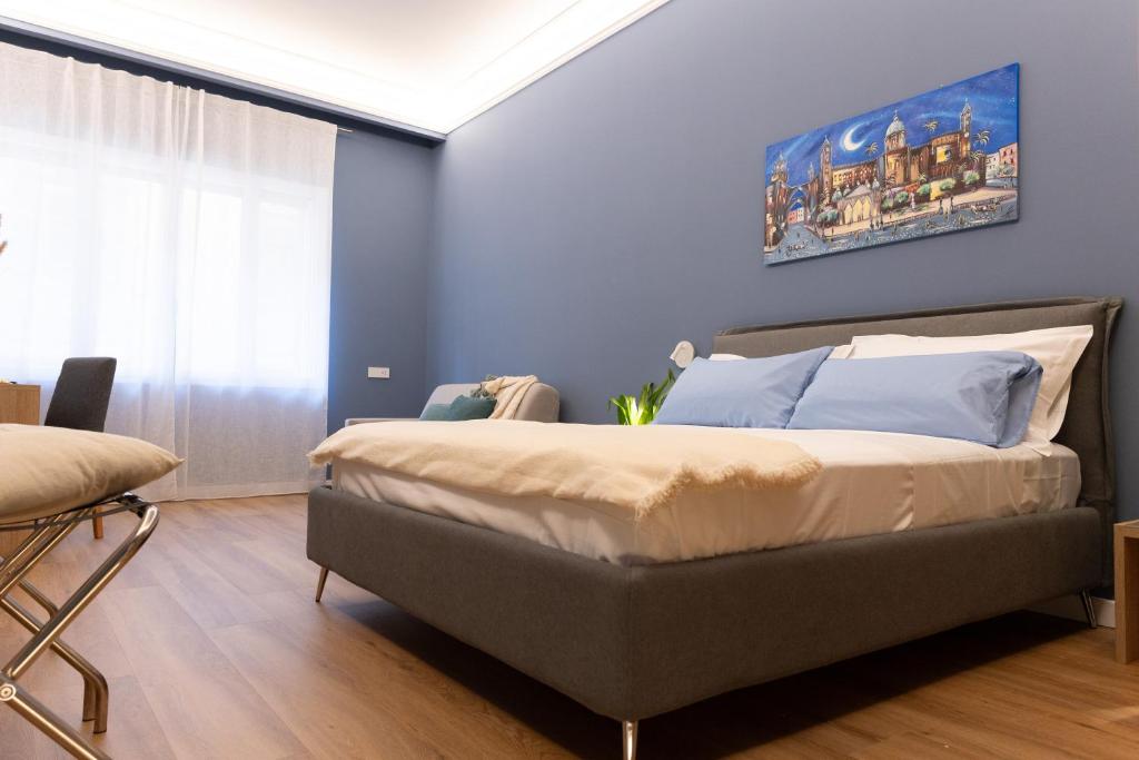 Postel nebo postele na pokoji v ubytování Quattro Canti Deluxe