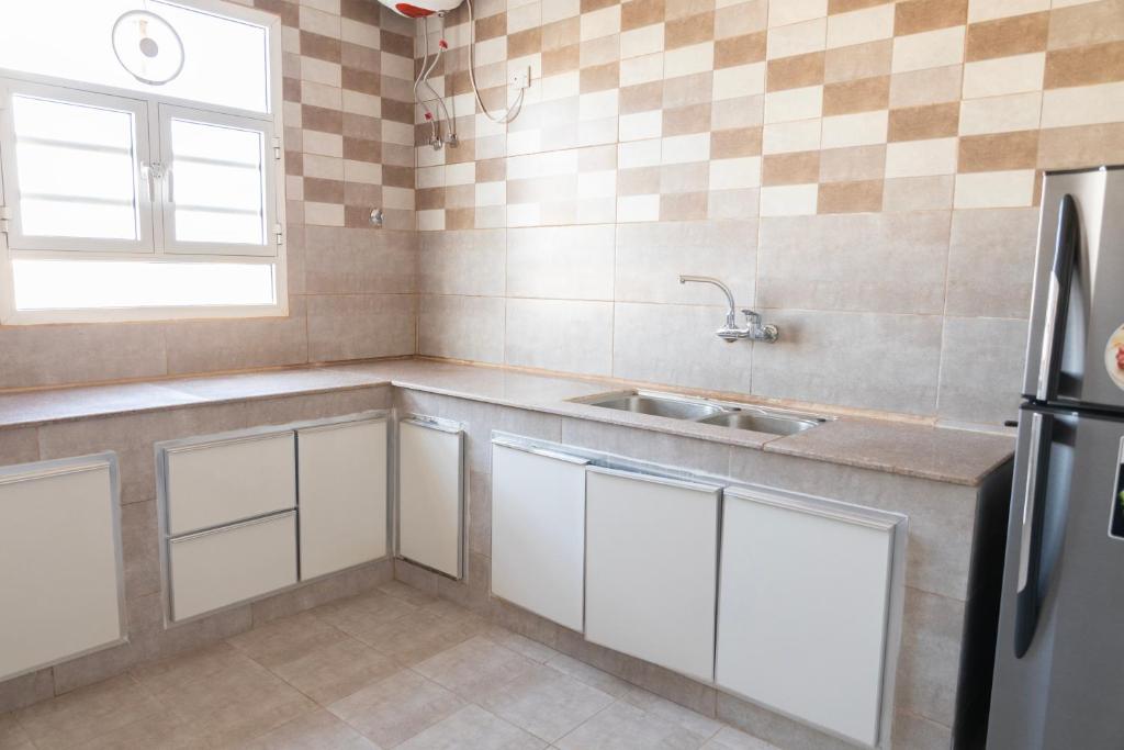 Kuchyň nebo kuchyňský kout v ubytování Riviera suites , hotel apartement