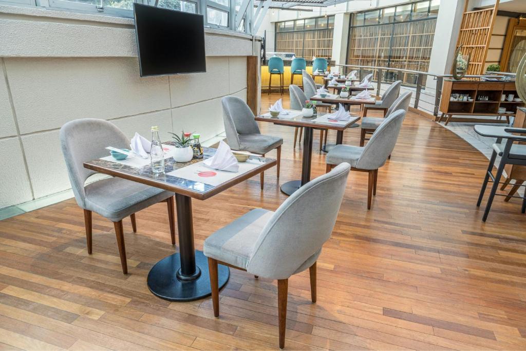TV a/nebo společenská místnost v ubytování Sheraton Quito