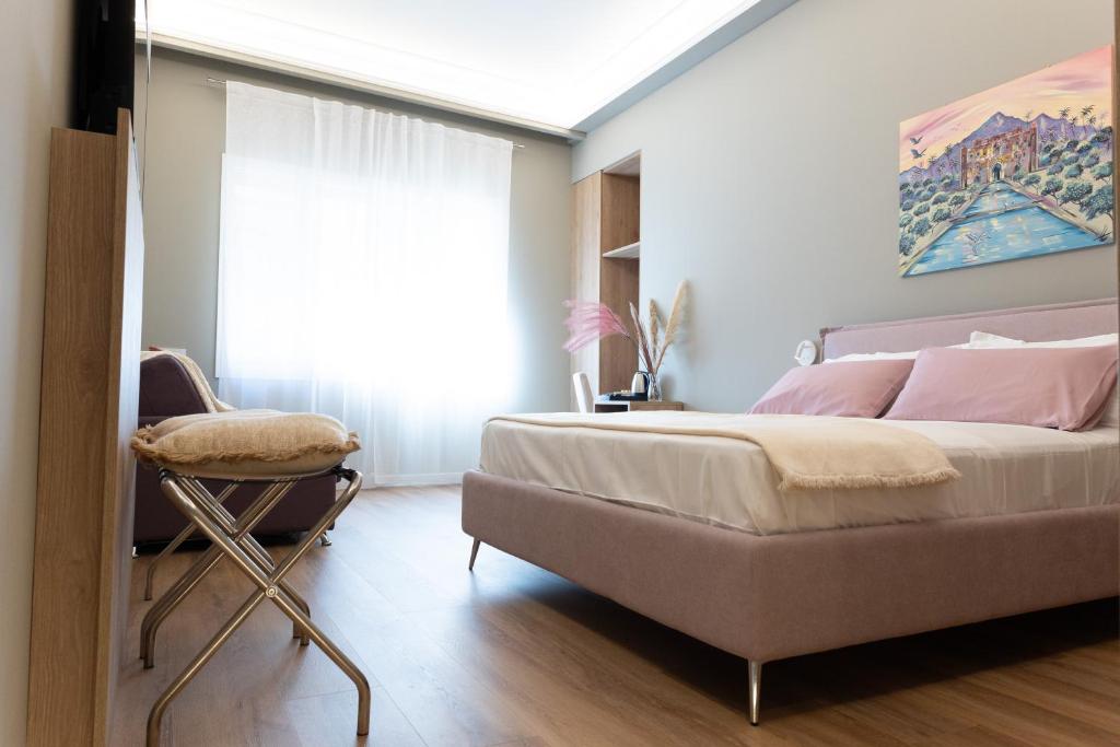 Postel nebo postele na pokoji v ubytování Quattro Canti Deluxe