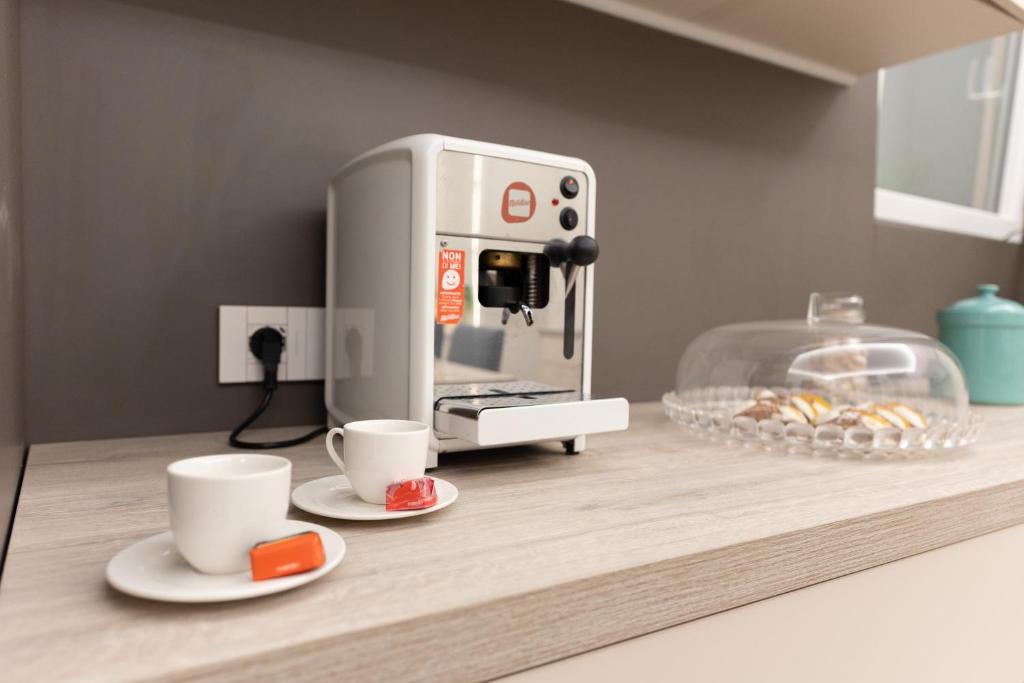 Příslušenství pro přípravu čaje a kávy v ubytování Quattro Canti Deluxe