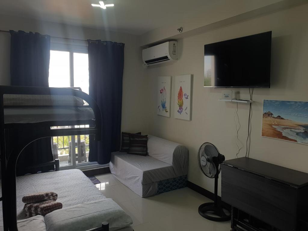 Μια τηλεόραση ή/και κέντρο ψυχαγωγίας στο Yolanda condotel