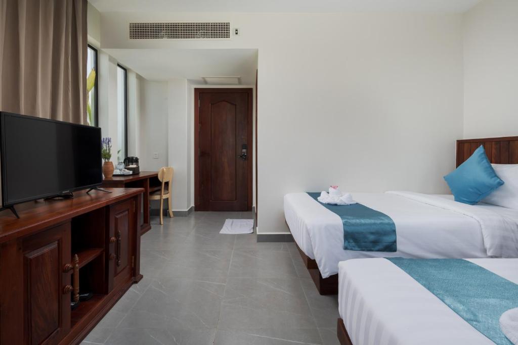 TV a/nebo společenská místnost v ubytování Angkor Channary Hotel