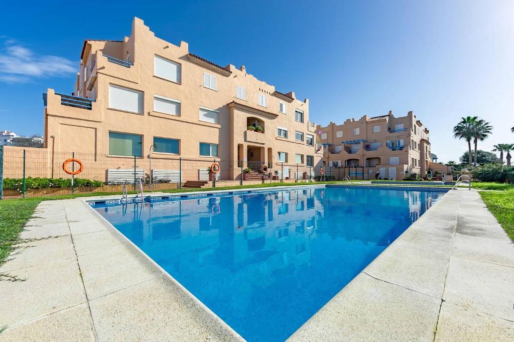 Bazén v ubytovaní Duplex Surla Pájaro vistas al mar alebo v jeho blízkosti