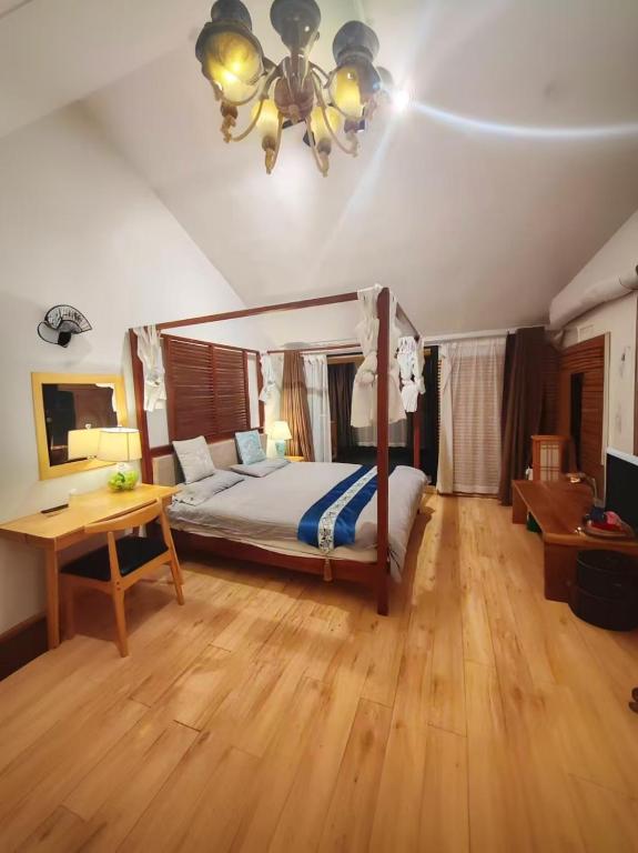 Postel nebo postele na pokoji v ubytování 枕窗听雨Homestay