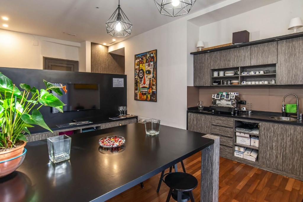 Kuchyňa alebo kuchynka v ubytovaní Gram Suites