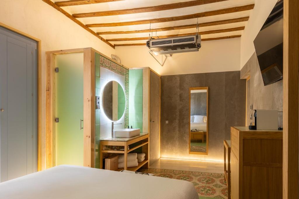 TV a/nebo společenská místnost v ubytování Hotel Carlos V