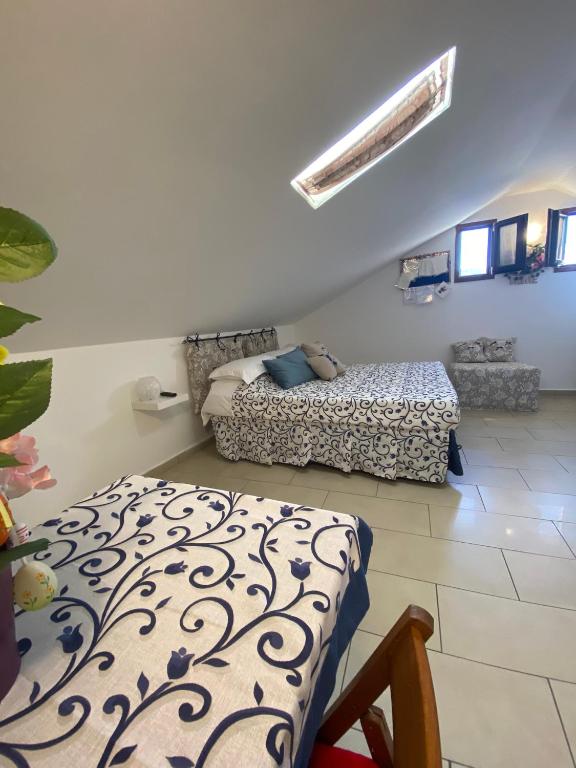 Postel nebo postele na pokoji v ubytování B&B FRAI