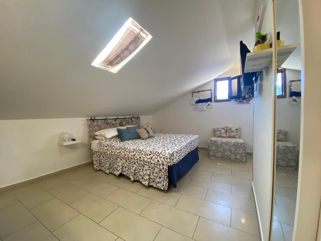 Postel nebo postele na pokoji v ubytování B&B FRAI