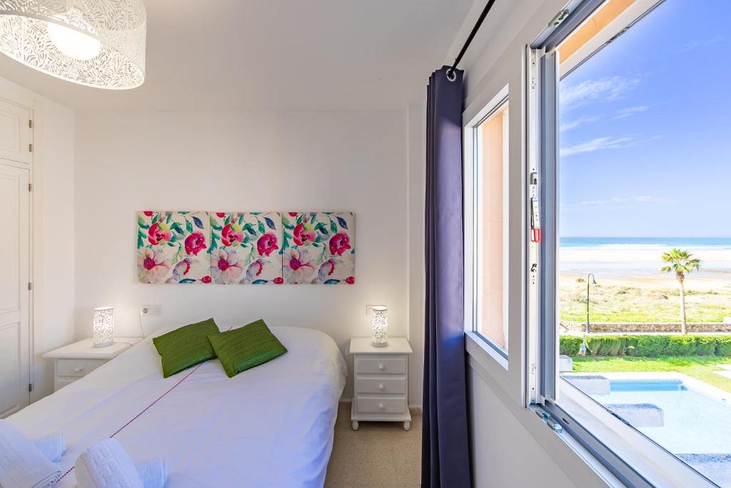 Posteľ alebo postele v izbe v ubytovaní Duplex Surla Pájaro vistas al mar