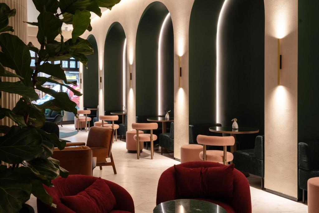 Ein Sitzbereich in der Unterkunft Hotel Mundial