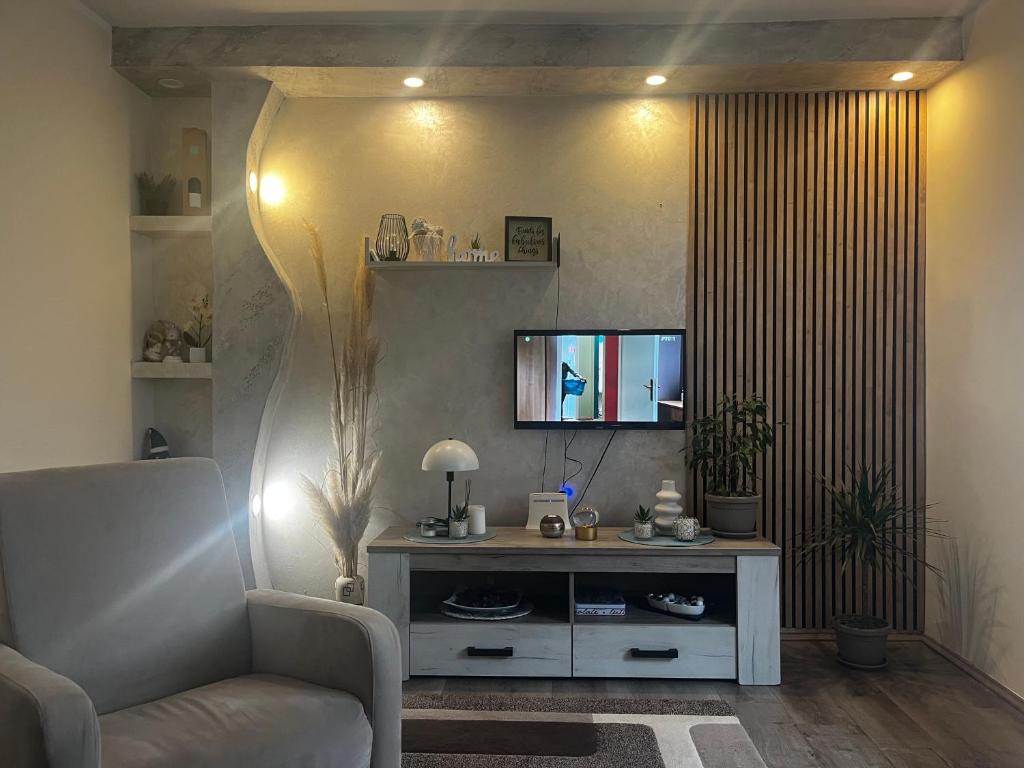 TV a/nebo společenská místnost v ubytování Tea i Una