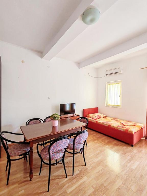 Postel nebo postele na pokoji v ubytování Apartmani i sobe Šagarjelo