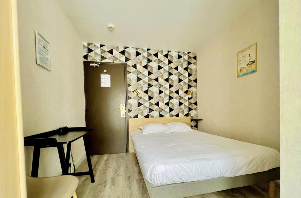 Postel nebo postele na pokoji v ubytování Hôtel Le Littoral - Berck sur Mer