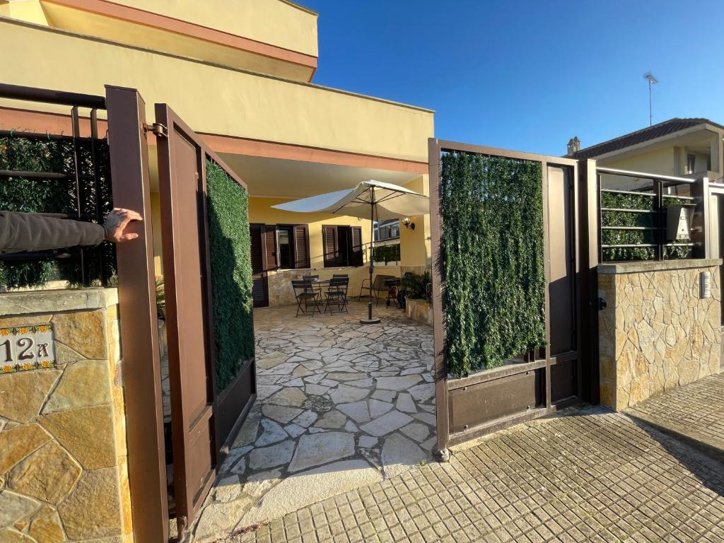 an open door of a building with a patio at San Cataldo Holiday's in San Cataldo
