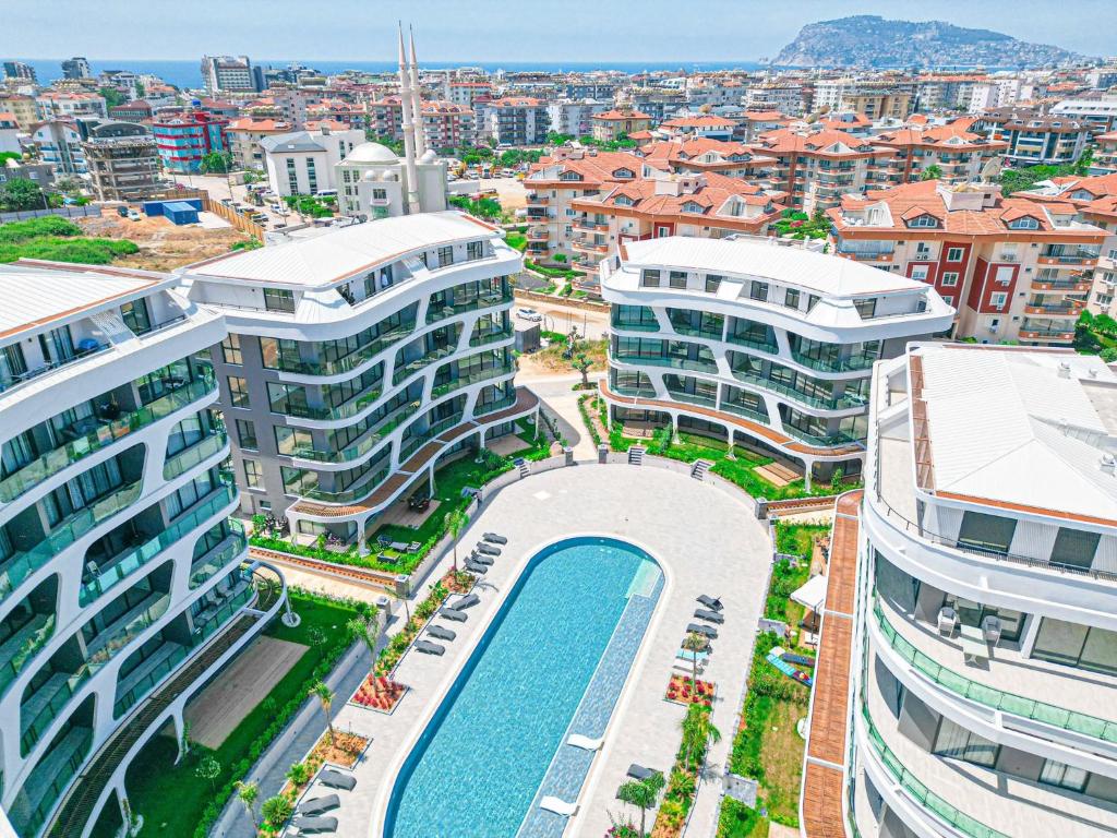 an aerial view of buildings in a city at Sol Garden Residence F16 in Alanya