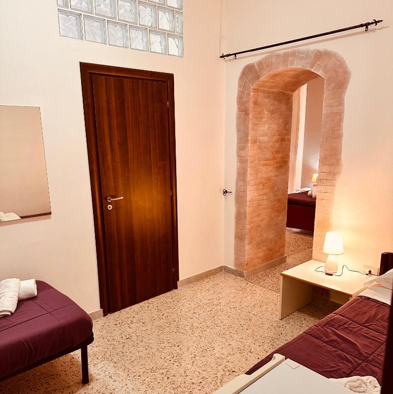 Postel nebo postele na pokoji v ubytování B&B Dora 2,0