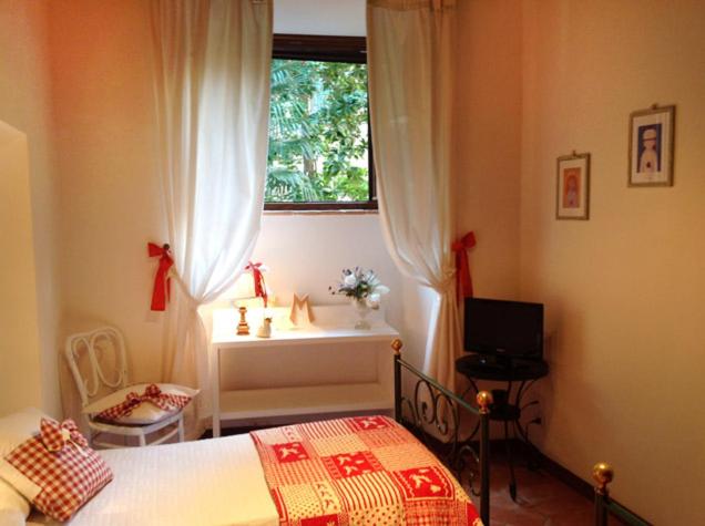 Postel nebo postele na pokoji v ubytování B&B Michelangeli - Private parking