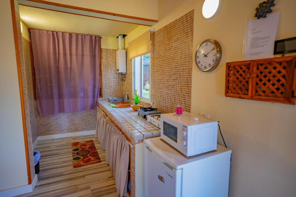 Kuchyň nebo kuchyňský kout v ubytování Casa Rural Buda Terra