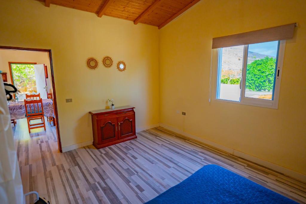 Postel nebo postele na pokoji v ubytování Casa Rural Buda Terra
