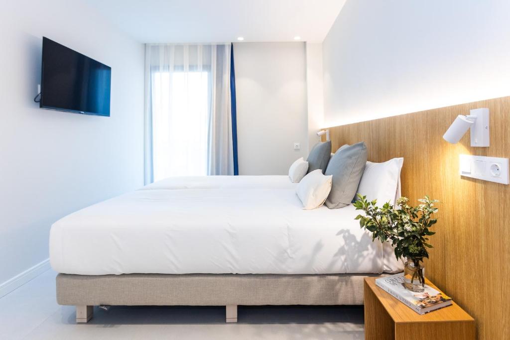 Postel nebo postele na pokoji v ubytování Fels Apartments