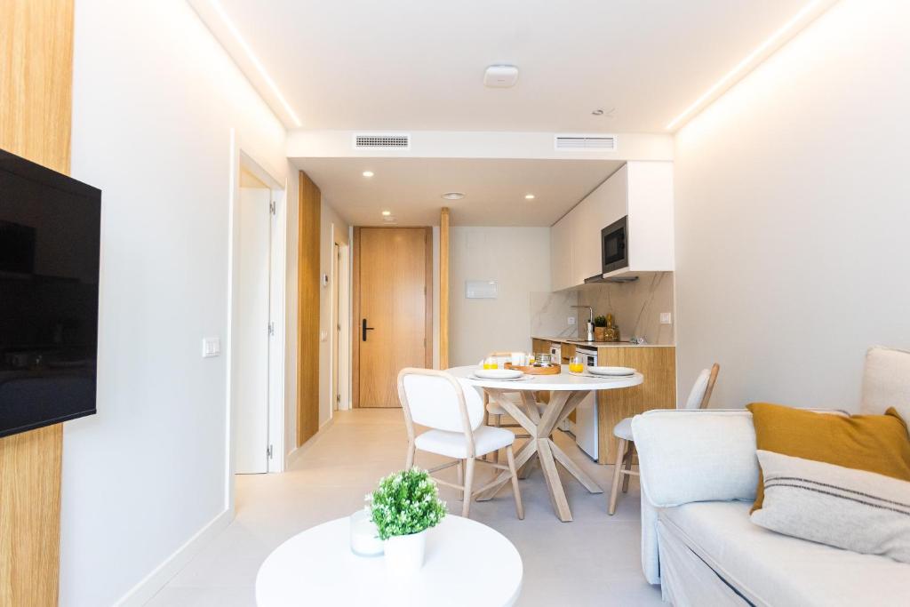 TV a/nebo společenská místnost v ubytování Fels Apartments