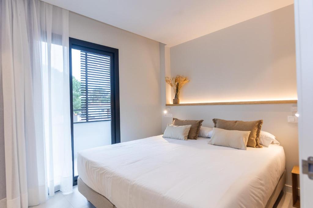 Postel nebo postele na pokoji v ubytování Fels Apartments