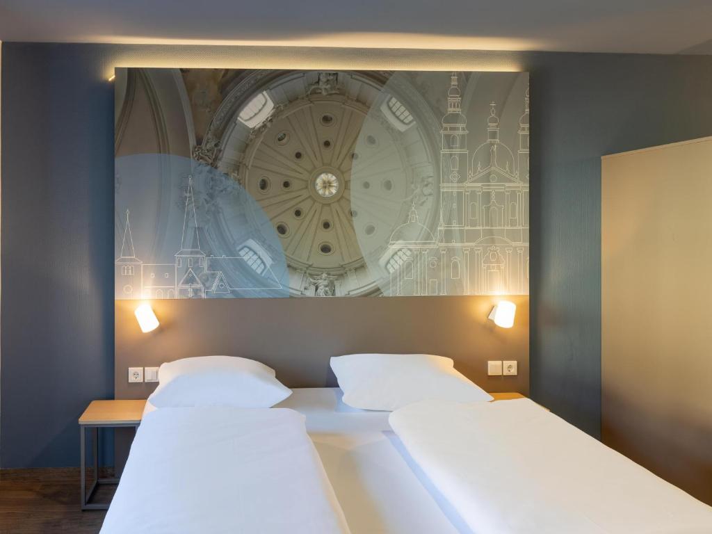 Voodi või voodid majutusasutuse B&B HOTEL Fulda-Hbf toas