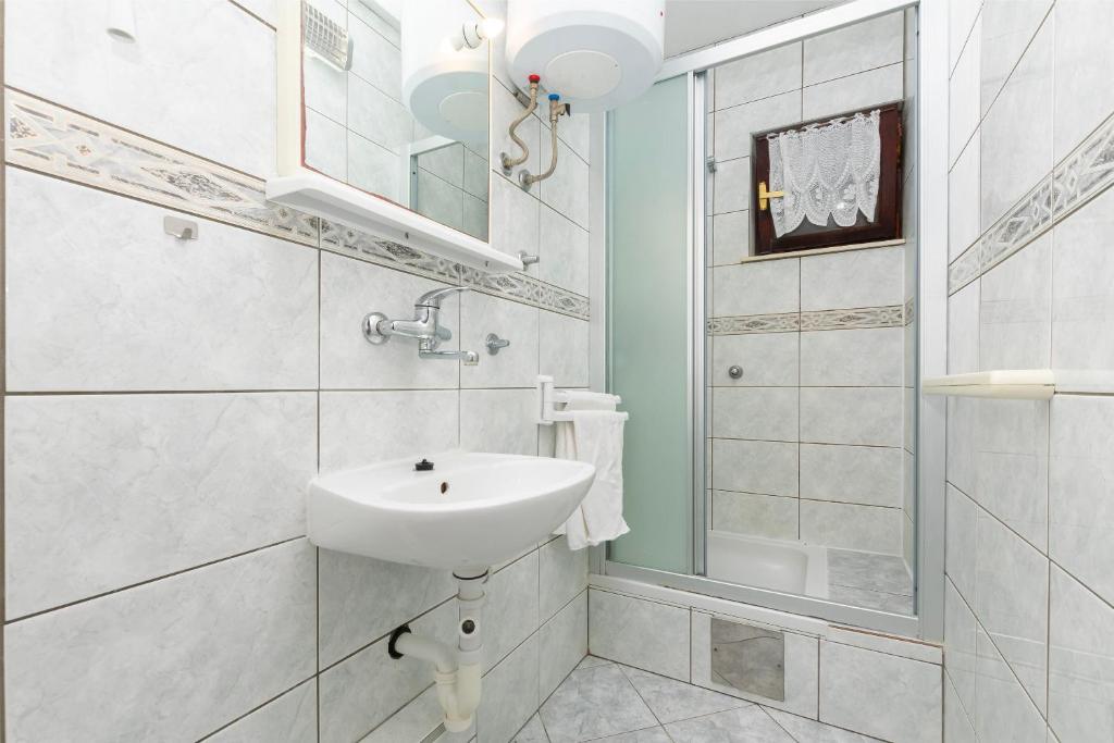 Kúpeľňa v ubytovaní Apartments Ivo