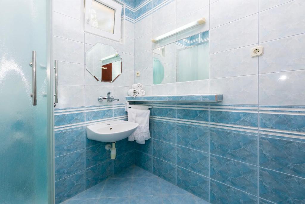 Kúpeľňa v ubytovaní Apartments Ivo
