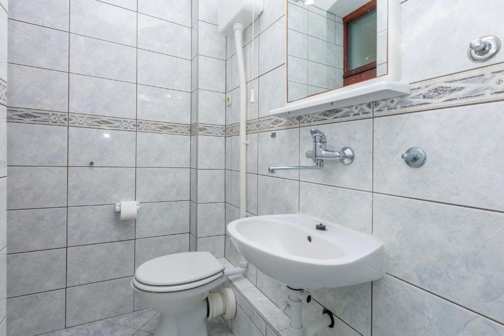 Kúpeľňa v ubytovaní Apartments Ivo