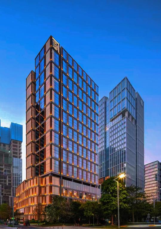 a rendering of a tall building in a city at Bene International Hotel Zhujiang New Town US Consulate General Guangzhou Branch in Guangzhou