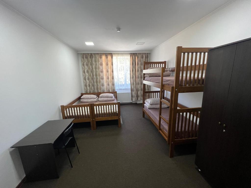 Postel nebo postele na pokoji v ubytování PETROVICH hotel