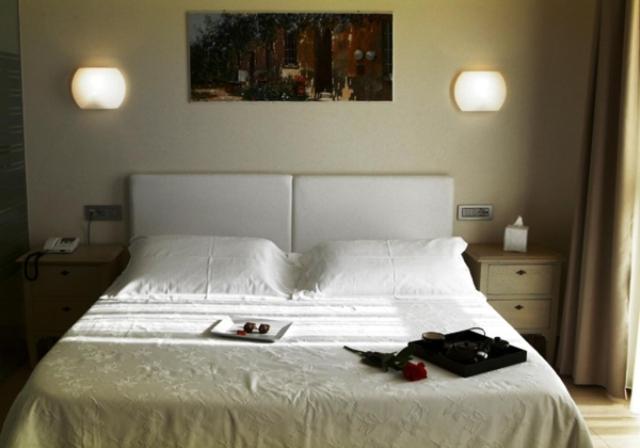 Postel nebo postele na pokoji v ubytování Hotel Piccolo Principe