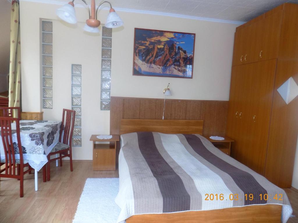 Posteľ alebo postele v izbe v ubytovaní Molnár Apartment