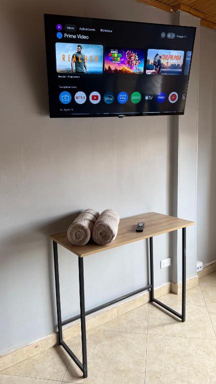 TV a/nebo společenská místnost v ubytování Hostelfc Movistar57