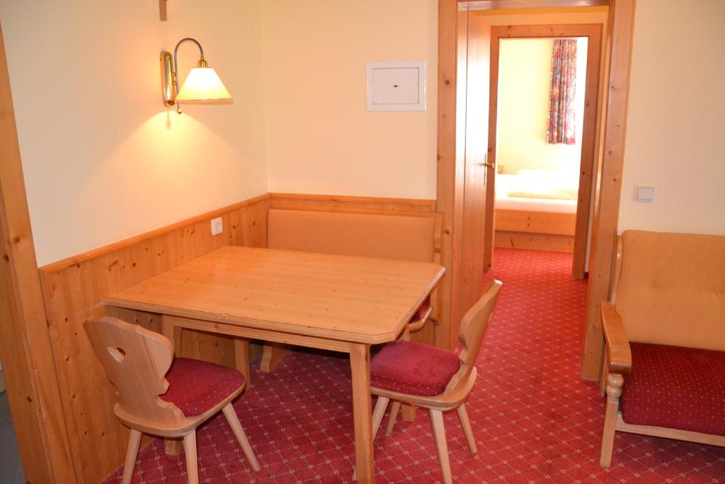 Posedenie v ubytovaní Holiday-Appartements