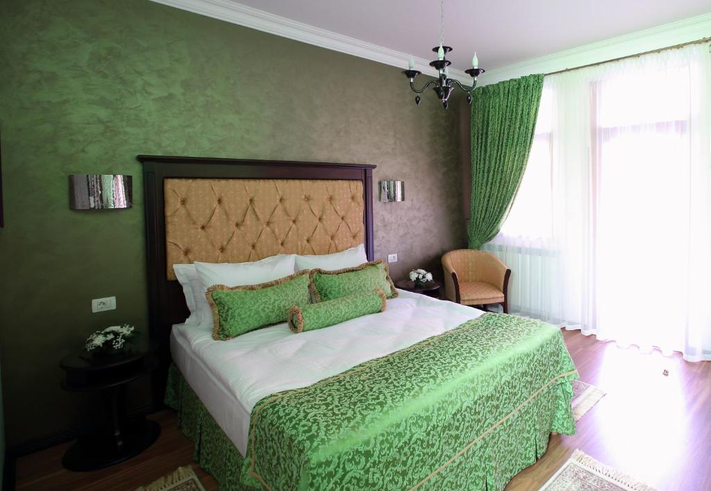 Postel nebo postele na pokoji v ubytování Hotel Galany
