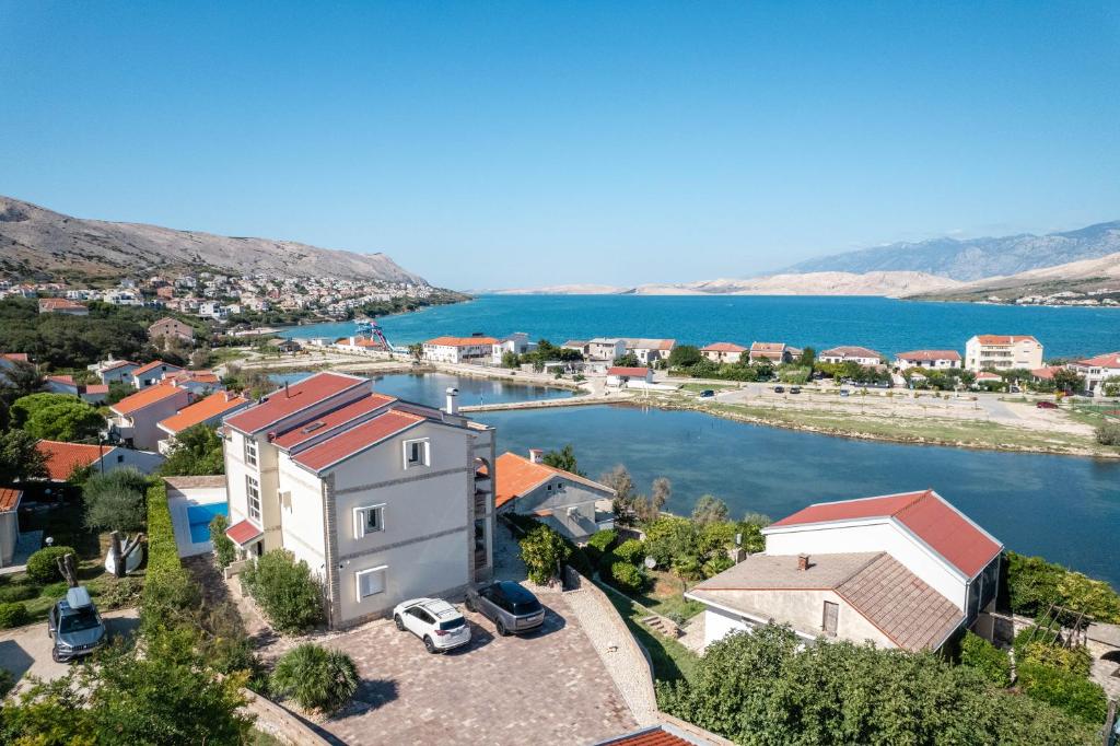 an aerial view of a small town next to a body of water at Villa Vujeva in Pag