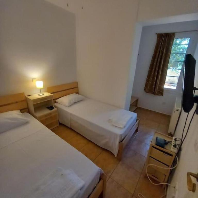 Postel nebo postele na pokoji v ubytování Anatoli in Nea Makri