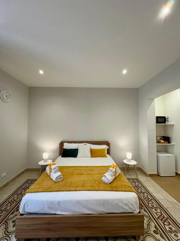Letto o letti in una camera di Renda36