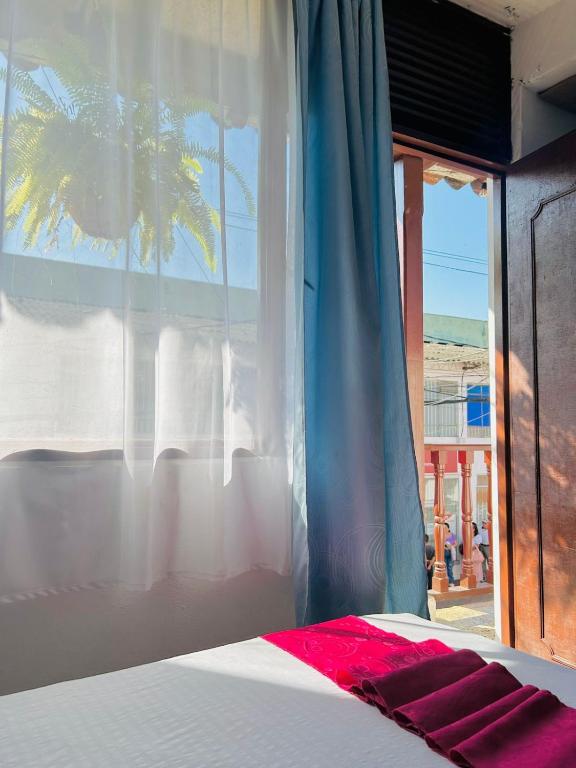 Postel nebo postele na pokoji v ubytování CasaGitanos Hotel