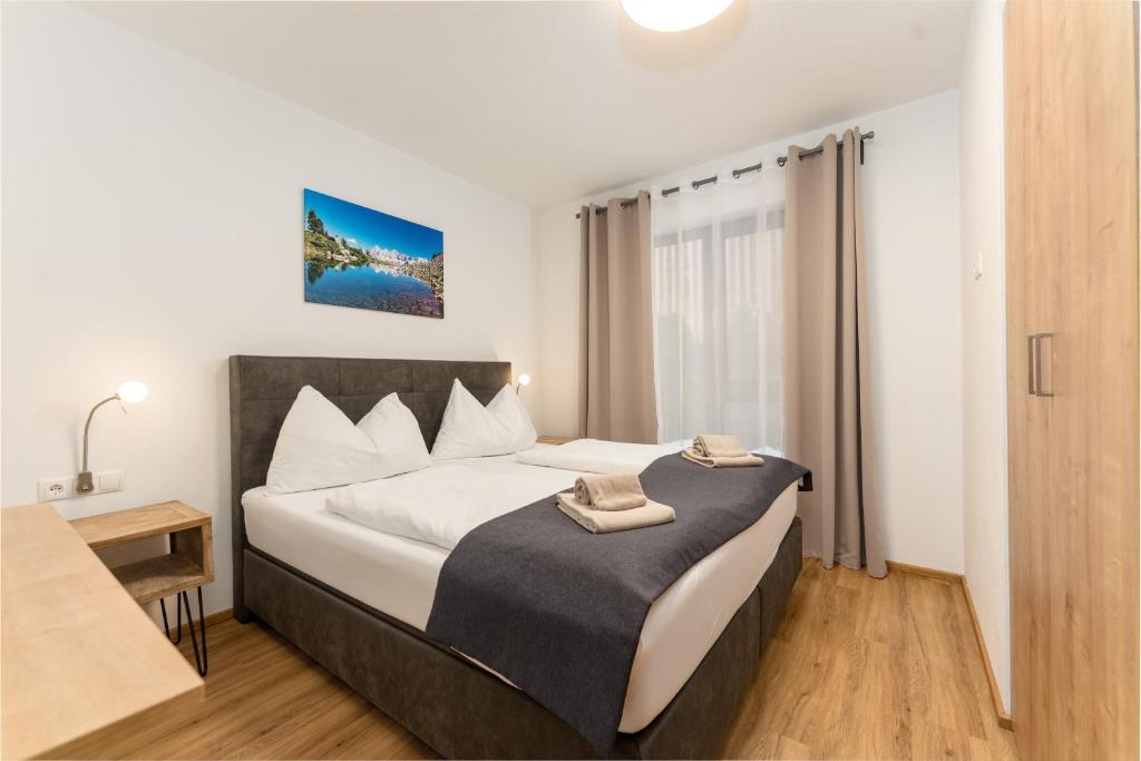 Posteľ alebo postele v izbe v ubytovaní Appartements by Chalet Reiteralm -Sommercard