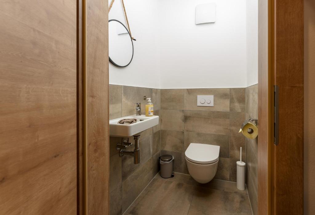 Kúpeľňa v ubytovaní Appartements by Chalet Reiteralm -Sommercard