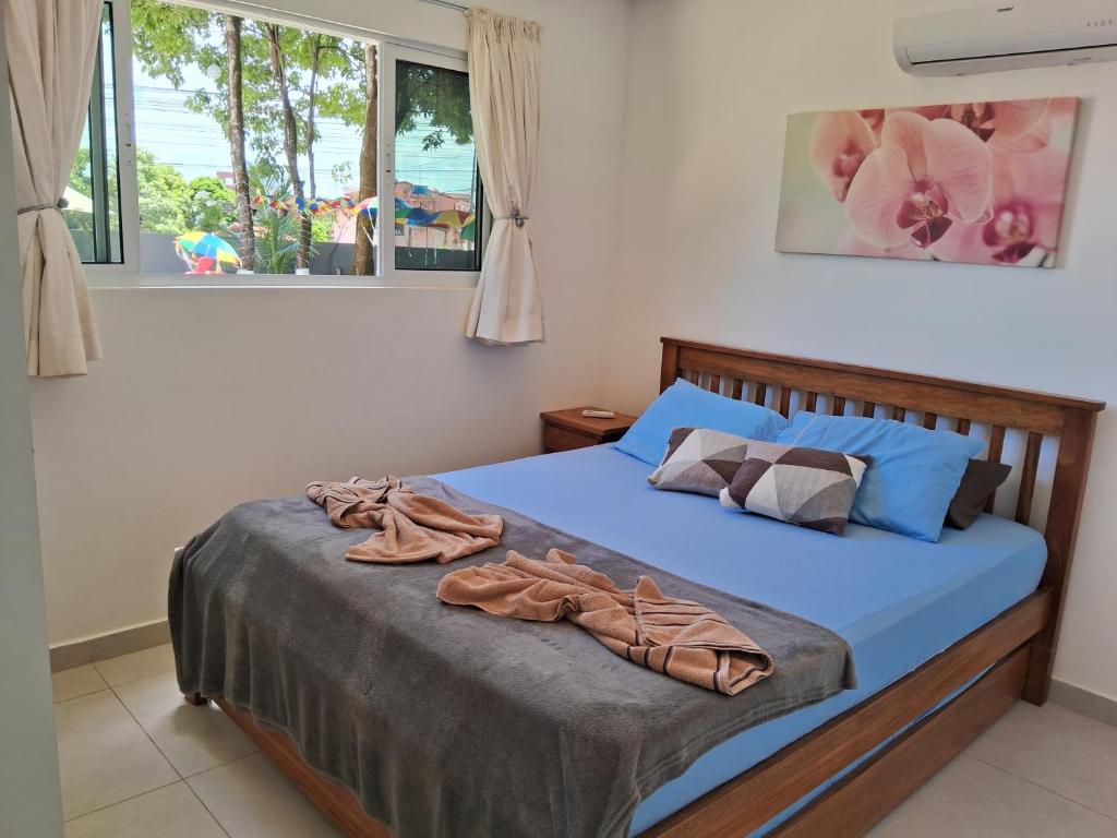 Giường trong phòng chung tại Nosso Cantinho em Porto