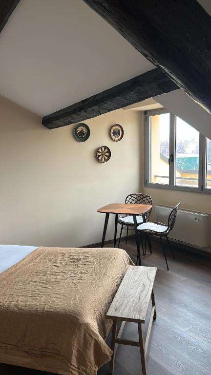 Postel nebo postele na pokoji v ubytování Ca' D'Adda